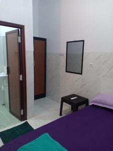 Postel nebo postele na pokoji v ubytování Homestay 89 New