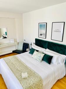 Кровать или кровати в номере Hotel Carbonell