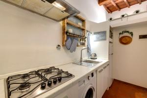 A kitchen or kitchenette at Vinegia N5 - Clemente & Settimo Apartments
