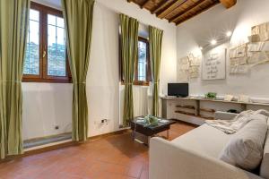 A television and/or entertainment centre at Vinegia N5 - Clemente & Settimo Apartments