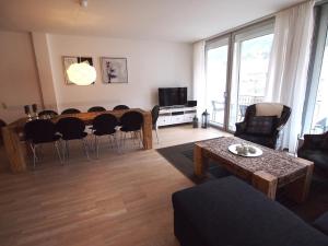 Televízia a/alebo spoločenská miestnosť v ubytovaní Haus Lothringen by AlpenTravel