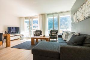 TV a/nebo společenská místnost v ubytování Haus Lothringen by AlpenTravel