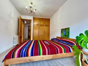 Postel nebo postele na pokoji v ubytování Ca Blai de Brull en el centro de Tivissa
