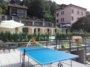 Stolní tenis v ubytování Oleandro 2 apartment in Villa Cerutti nebo okolí