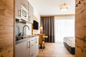 Kuchyň nebo kuchyňský kout v ubytování Kopeindlgut Apartments
