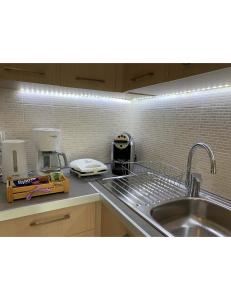 a kitchen with a sink and a counter top at Muses Studios Sami in Sami +37 photos