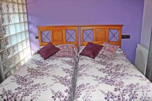 A bed or beds in a room at Hotel Apartamentos Melihah