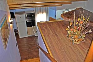 A kitchen or kitchenette at Hotel Apartamentos Melihah