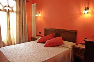 A bed or beds in a room at Hotel Apartamentos Melihah