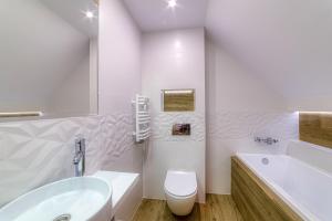 Łazienka w obiekcie APARTAMENTY NA SKARPIE