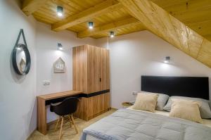 Łóżko lub łóżka w pokoju w obiekcie APARTAMENTY NA SKARPIE