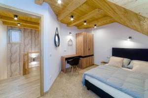 Łóżko lub łóżka w pokoju w obiekcie APARTAMENTY NA SKARPIE