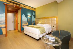 מיטה או מיטות בחדר ב-c-hotels Rubens