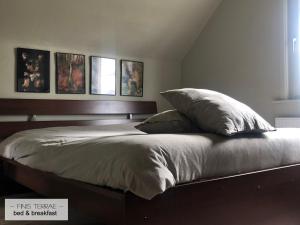Tempat tidur dalam kamar di Huis aan Puyenbroeck