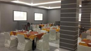 Posezení v ubytování Sangam Hotel, Thanjavur