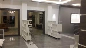 Posezení v ubytování Sangam Hotel, Thanjavur