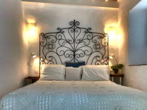 Posteľ alebo postele v izbe v ubytovaní CASA LA FUENTE D Casas Vejer Debra