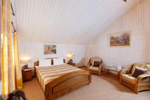 Postel nebo postele na pokoji v ubytování Park Hotel Berezka
