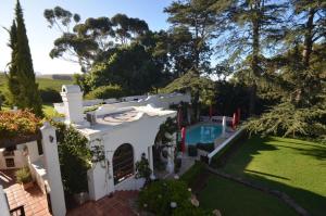 an aerial view of a house with a swimming pool at Le Jardin Villa in Stellenbosch