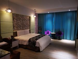 Postel nebo postele na pokoji v ubytování Love Story Motel