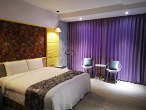 Postel nebo postele na pokoji v ubytování Love Story Motel + 7 fotografií