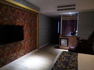 TV a/nebo společenská místnost v ubytování Love Story Motel
