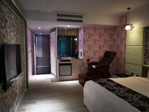 Postel nebo postele na pokoji v ubytování Love Story Motel