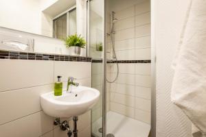 Koupelna v ubytování Hotel Jensen