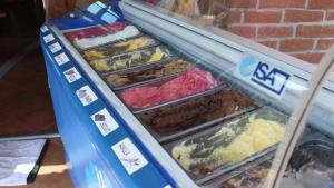 a display case filled with different types of food at Studio apartment in Novalja with sea view, terrace, air conditioning, Wi-Fi (3565-4) in Novalja