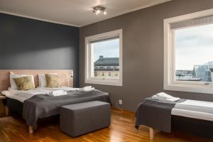 Postel nebo postele na pokoji v ubytování Fast Hotel Svolvær