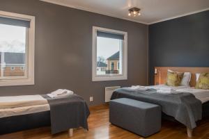Postel nebo postele na pokoji v ubytování Fast Hotel Svolvær