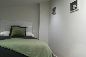 Postel nebo postele na pokoji v ubytování Casa Corredoira