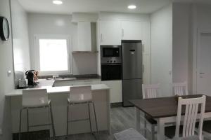 A kitchen or kitchenette at Casa Corredoira