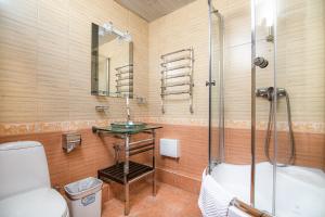 Ένα μπάνιο στο Отель Наутилус