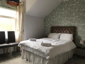 Letto o letti in una camera di The Colintraive