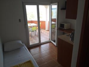 Kuchyňa alebo kuchynka v ubytovaní Apartments Bralic + 37 fotografií