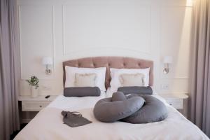 Łóżko lub łóżka w pokoju w obiekcie Mały Sopot Boutique