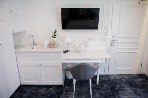 Telewizja i/lub zestaw kina domowego w obiekcie Mały Sopot Boutique