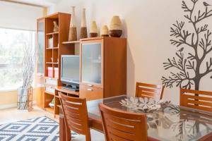 TV a/nebo společenská místnost v ubytování O´Porto Fontinha Flat