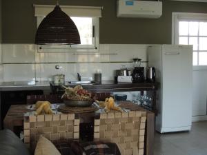 Virtuvė arba virtuvėlė apgyvendinimo įstaigoje Casa brava Lodge