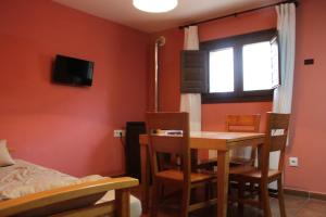 TV a/nebo společenská místnost v ubytování Apartamentos NOGUERA de ALBARRACÍN