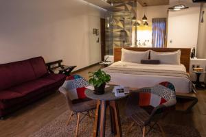 Postel nebo postele na pokoji v ubytování Cantera 10 Hotel Boutique + 37 fotografií