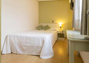 Postel nebo postele na pokoji v ubytování Hotel Platería + 27 fotografií