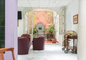 TV a/nebo společenská místnost v ubytování Hotel Platería