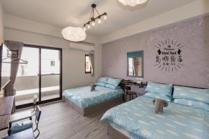 Ένα ή περισσότερα κρεβάτια σε δωμάτιο στο Island Nook B&B