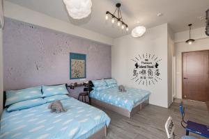 Ένα ή περισσότερα κρεβάτια σε δωμάτιο στο Island Nook B&B