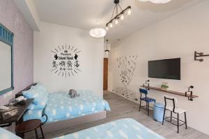Ένα ή περισσότερα κρεβάτια σε δωμάτιο στο Island Nook B&B