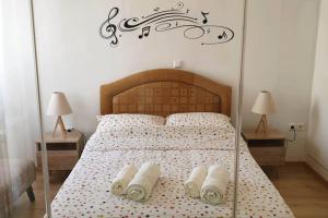 Posteľ alebo postele v izbe v ubytovaní Ground floor apt with rooftop and stunning view