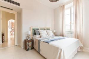 Posteľ alebo postele v izbe v ubytovaní B&B La Sosta degli Artisti