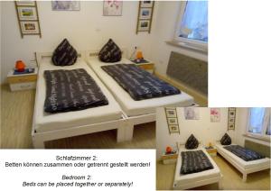 two beds sitting next to each other in a room at Ferienhaus Familie Bischof 97633 Sulzfeld - Leinach in Sulzfeld (im Grabfeld)